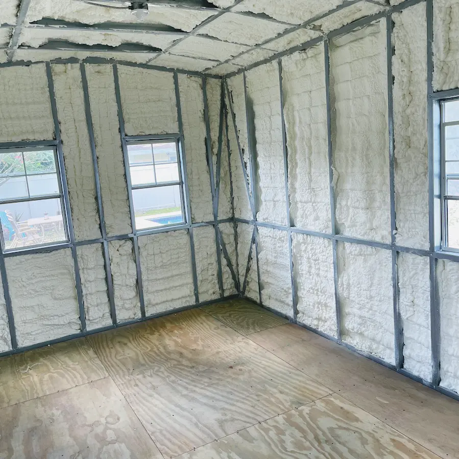Closed-cell spray foam insulation applied to wall cavities in a residential project in Anna